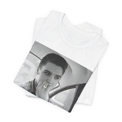 A black graphic t-shirt featuring a classic 50s era graphic of Elvis Presley.