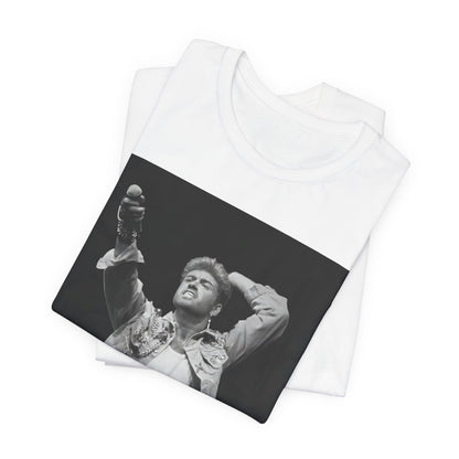 A black graphic t-shirt featuring a graphic or photo of George Michael performing live on stage.