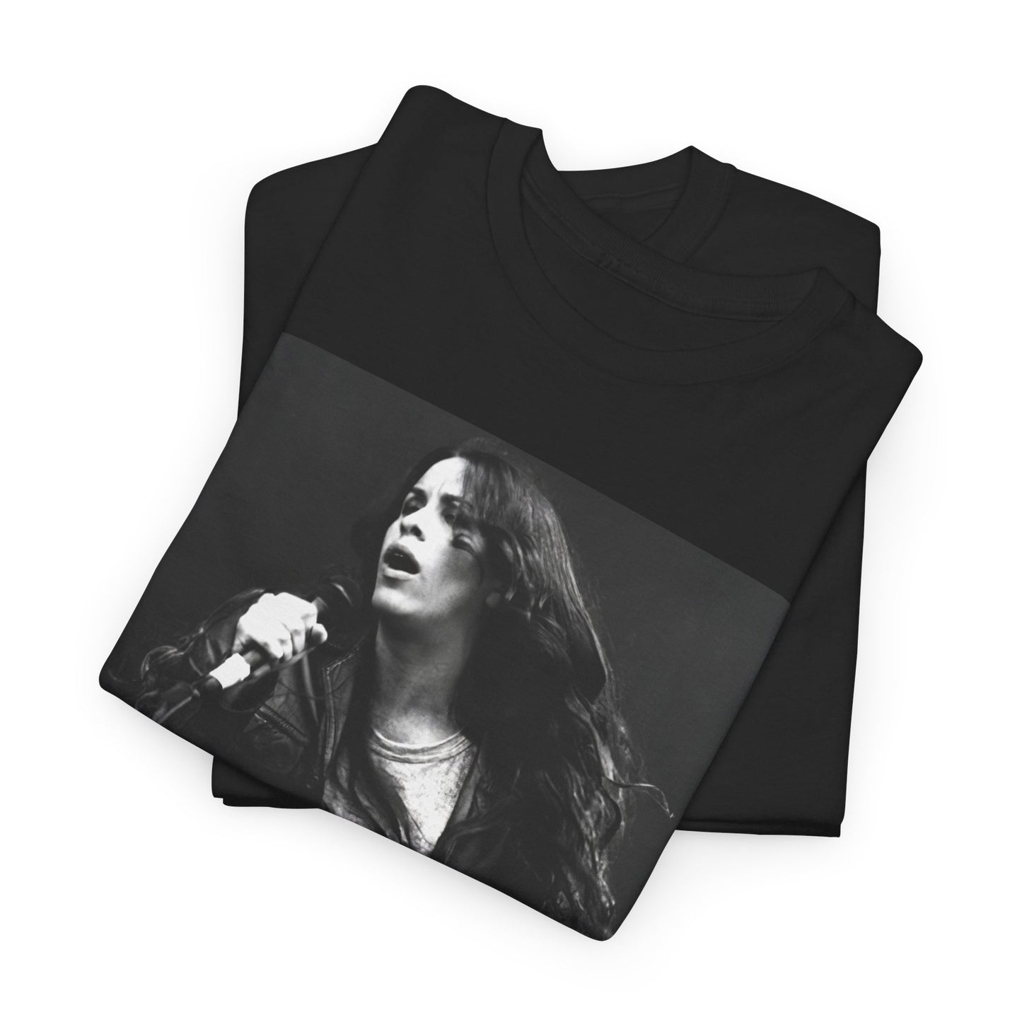 A black graphic t-shirt featuring a 90s-style concert graphic of Alanis Morissette, related to her "Jagged Little Pill" era tours.