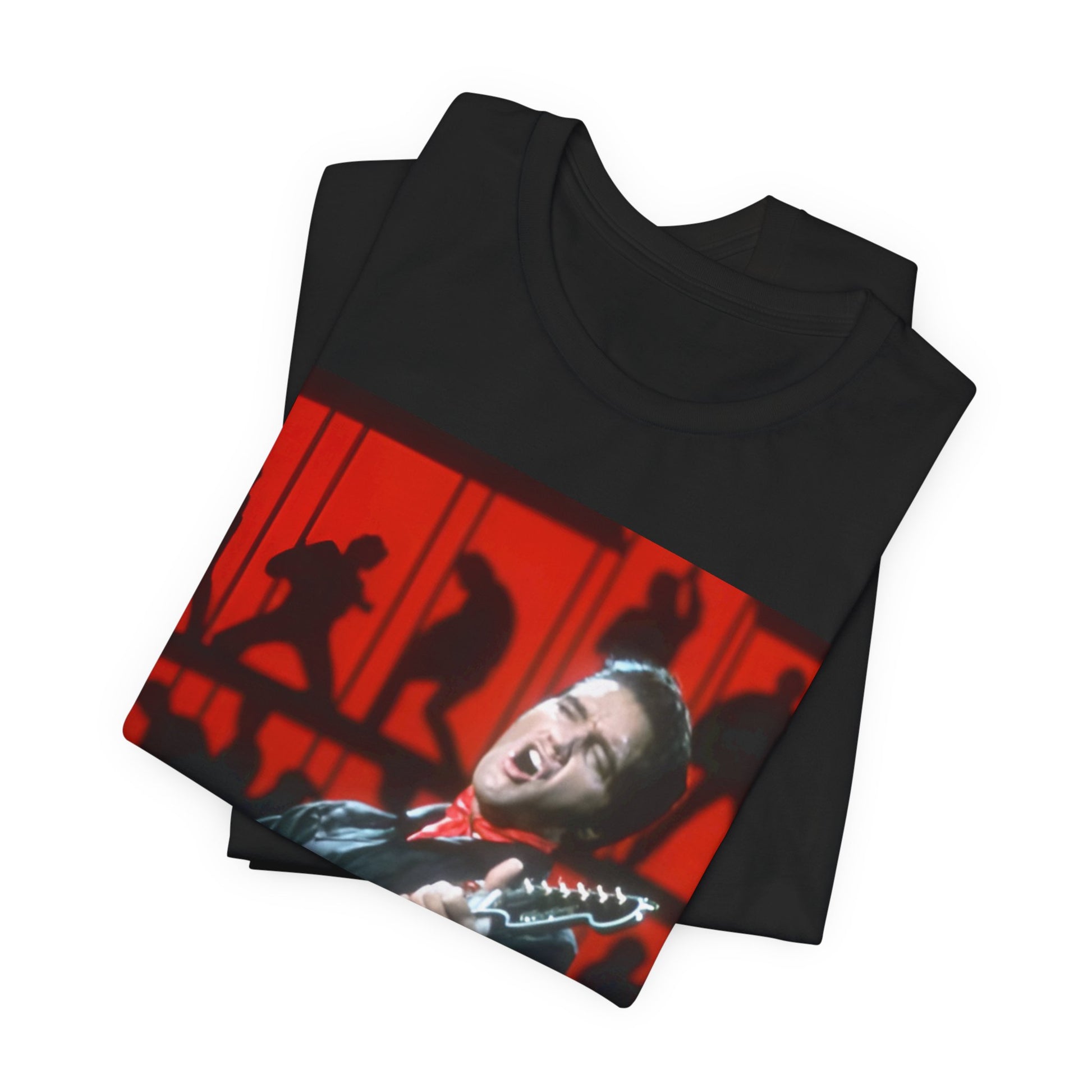 A black graphic t-shirt featuring a vintage photo of Elvis Presley from his Las Vegas residency.