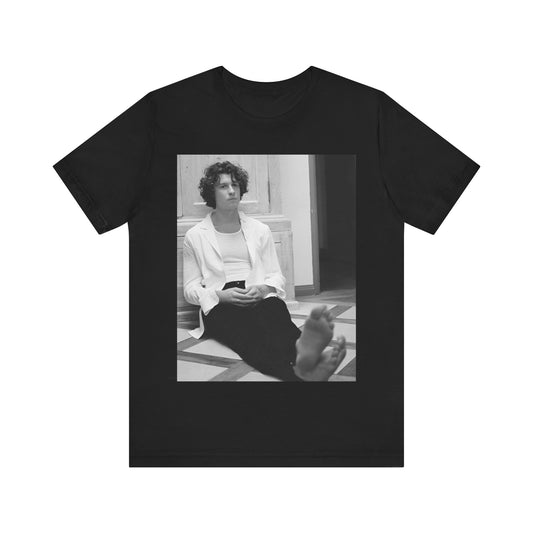 A black graphic t-shirt featuring a vintage casual style graphic of Shawn Mendes.