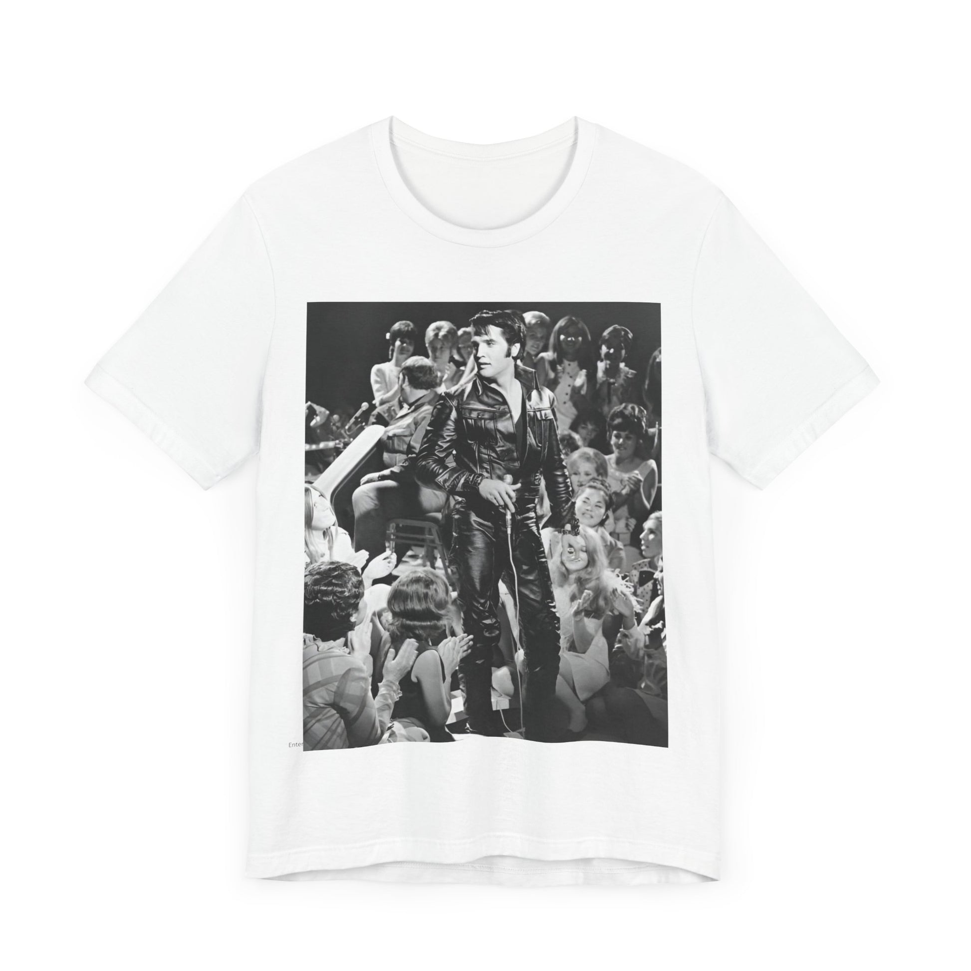 A black graphic t-shirt featuring a vintage black and white photo or graphic of Elvis Presley performing live on stage.