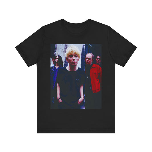 A black graphic t-shirt featuring a graphic of Radiohead as unapologetic art rock icons.