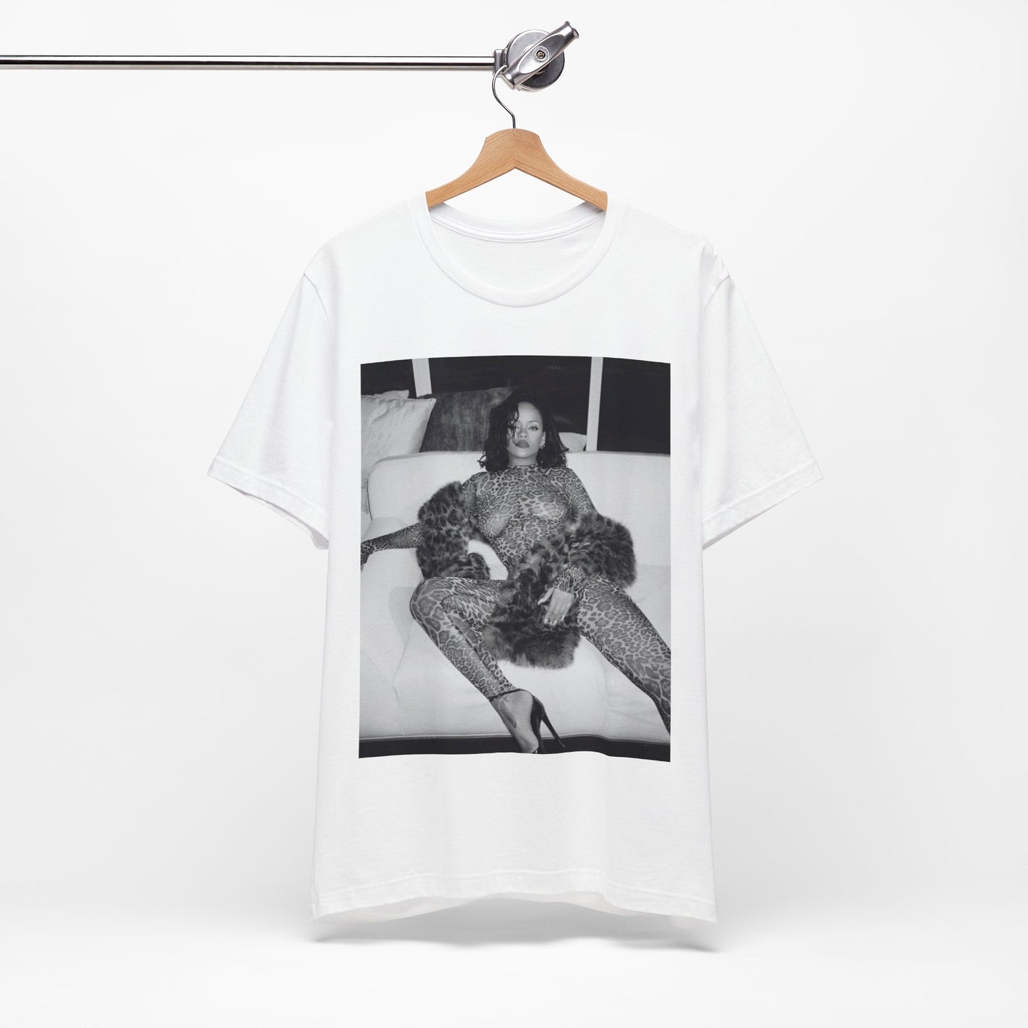 A black graphic t-shirt featuring a black and white, monochrome graphic or photo of Rihanna in a sexy pose.