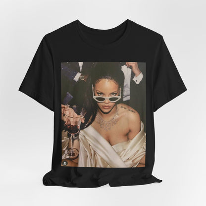 A black graphic t-shirt featuring a graphic of Rihanna as a 'Bad Gal Riri' fashion icon.