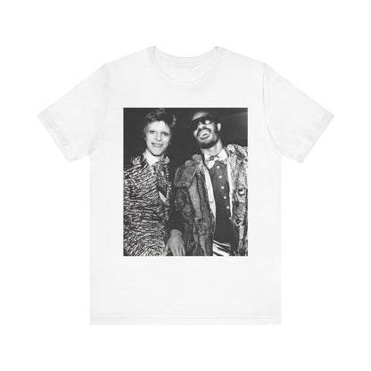 A black graphic t-shirt featuring a retro graphic of Stevie Wonder and David Bowie together.
