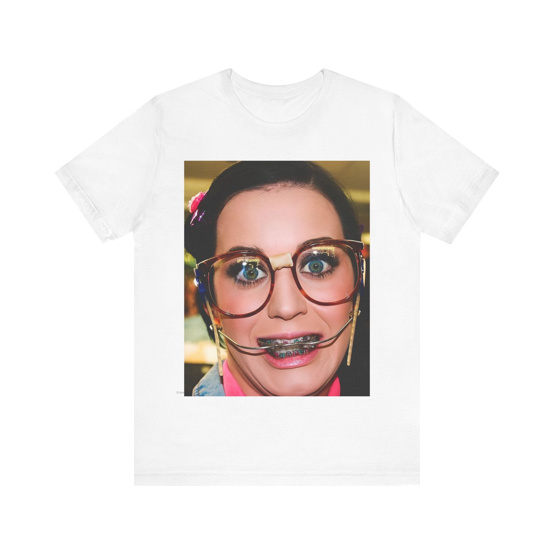 A black graphic t-shirt featuring a graphic related to Katy Perry's "I Kissed A Girl" song or era.