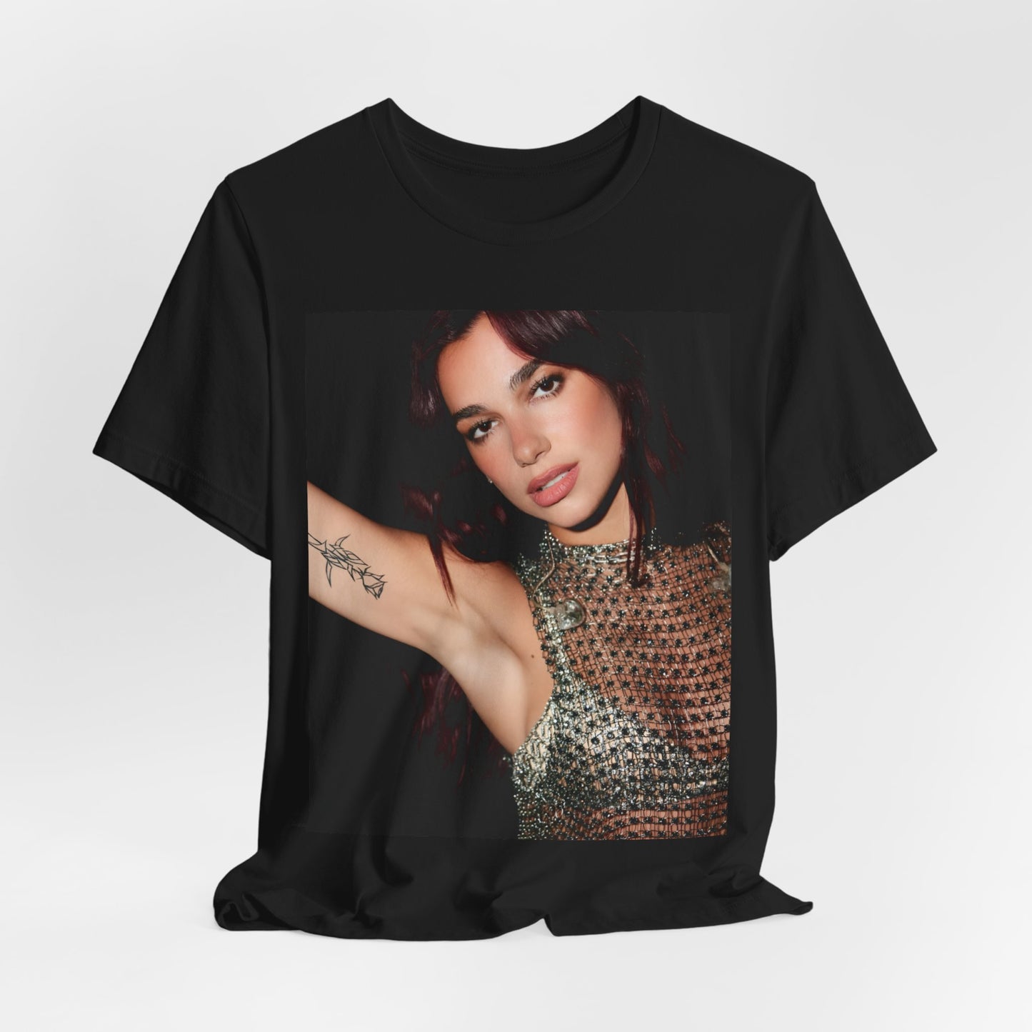 A black graphic t-shirt featuring a retro graphic inspired by Dua Lipa's "Don't Start Now" song.