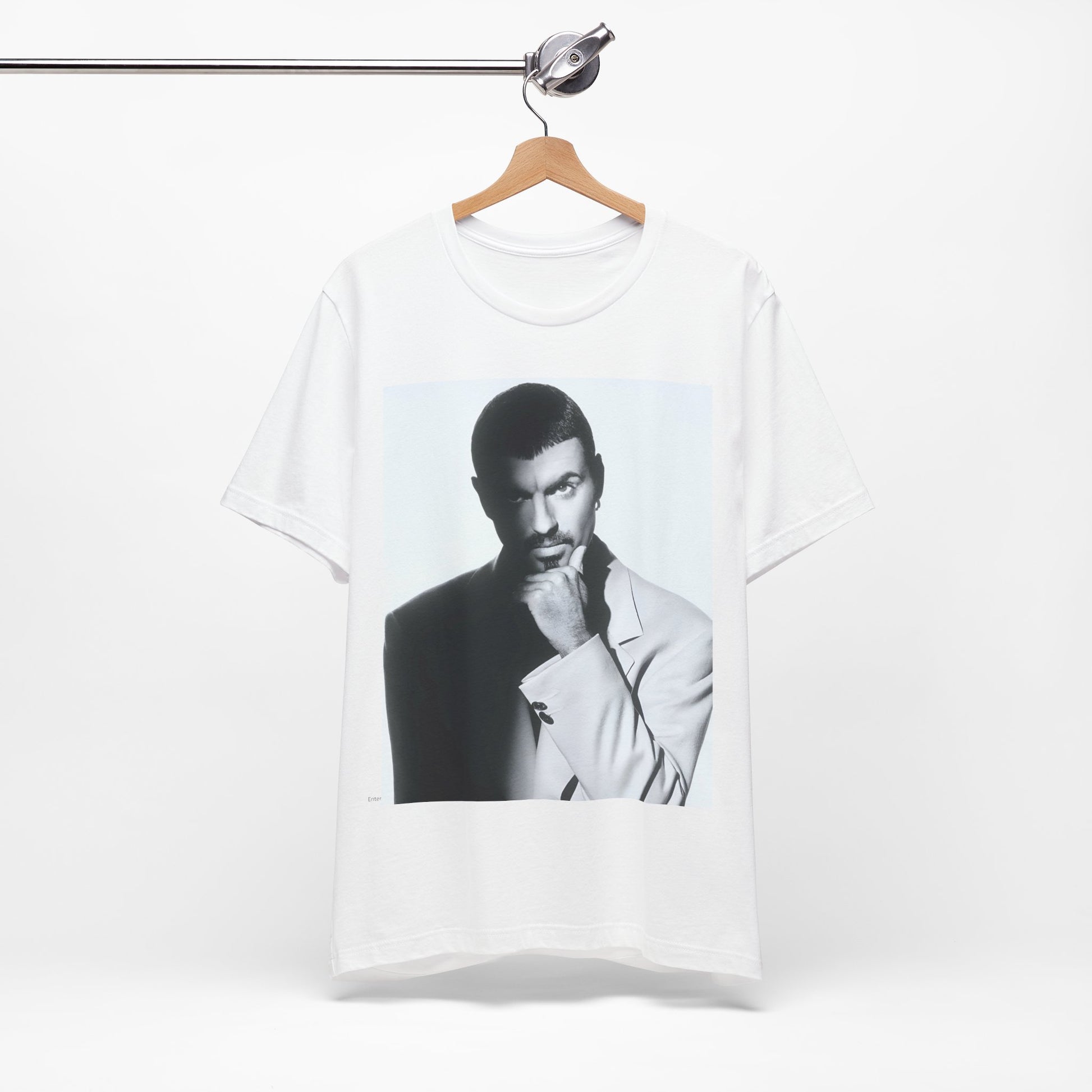 A black graphic t-shirt featuring a 90s aesthetic graphic of George Michael.