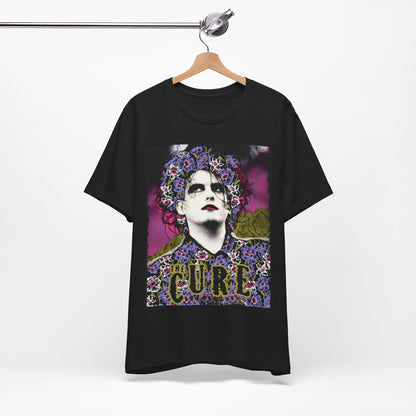 A black graphic t-shirt featuring a retro rock aesthetic pop art graphic of The Cure.