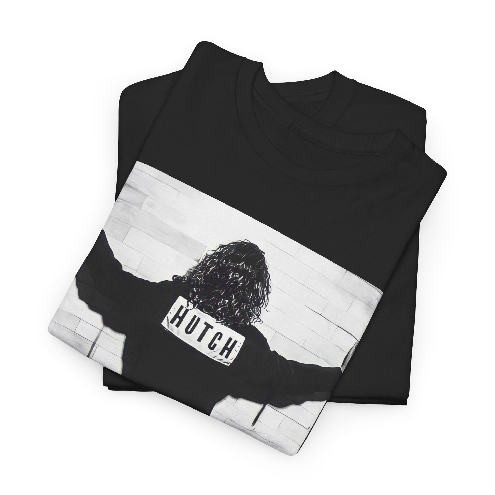 A black graphic t-shirt featuring a graphic of Michael Hutchence from INXS, labeled 'Hutch'.