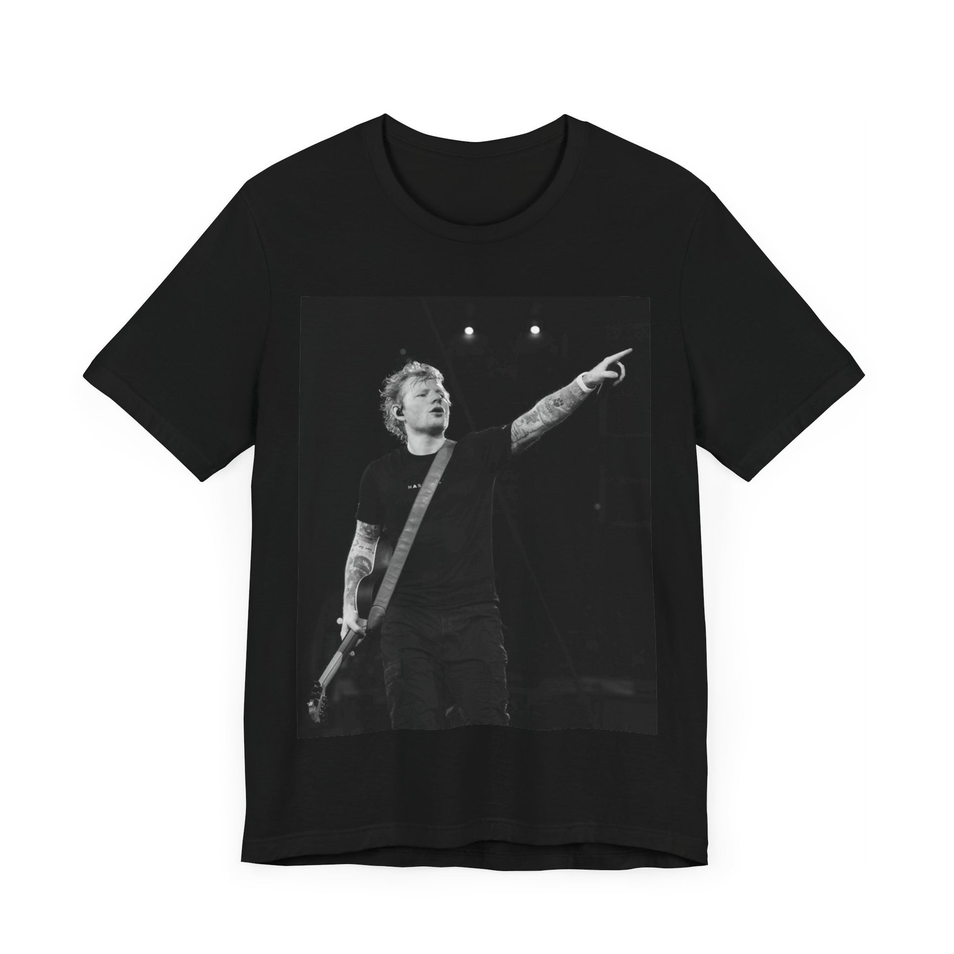 A black graphic t-shirt featuring a black and white graphic or photo of Ed Sheeran performing live on stage.