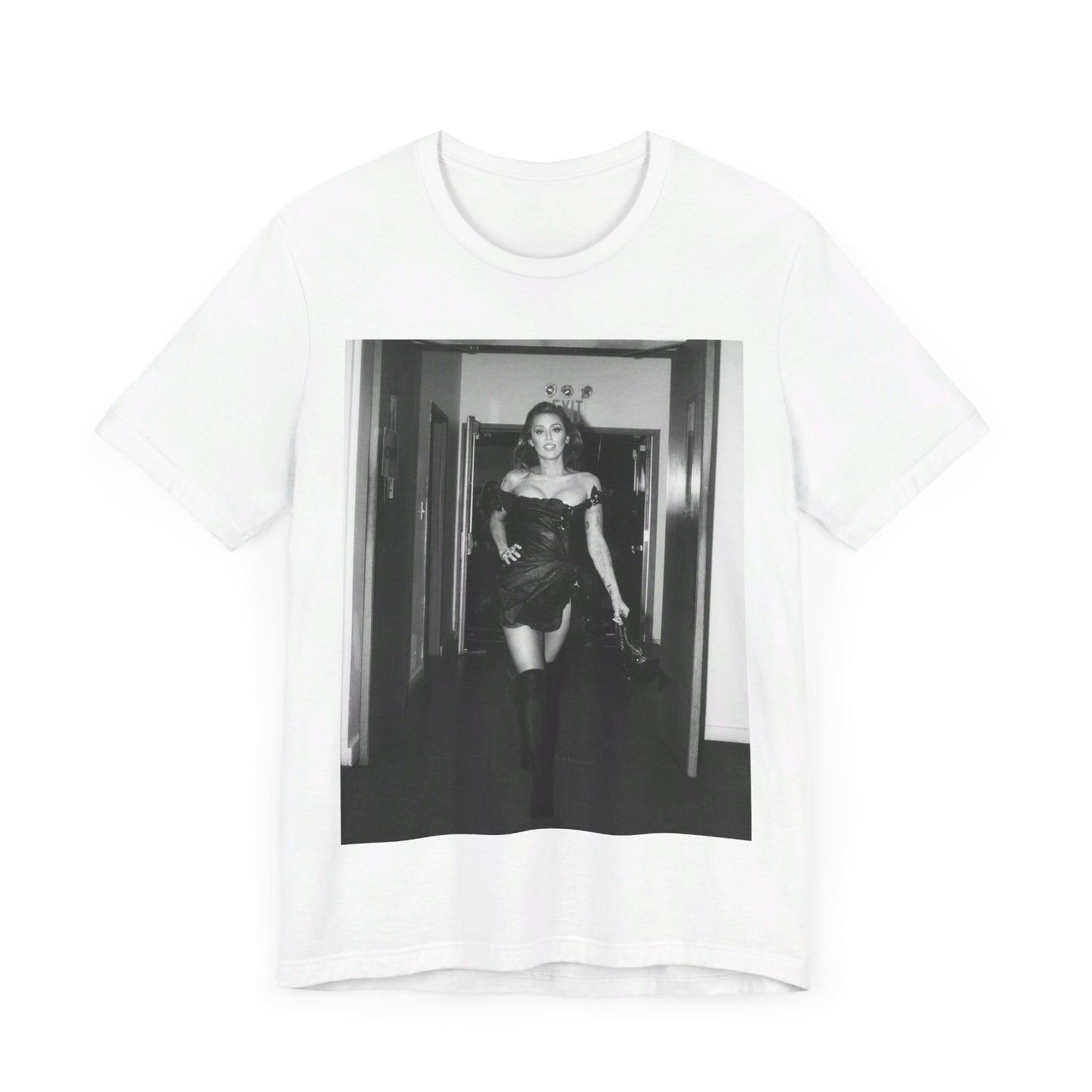 A black graphic t-shirt featuring a black and white graphic of Miley Cyrus in a cool pop rock style.