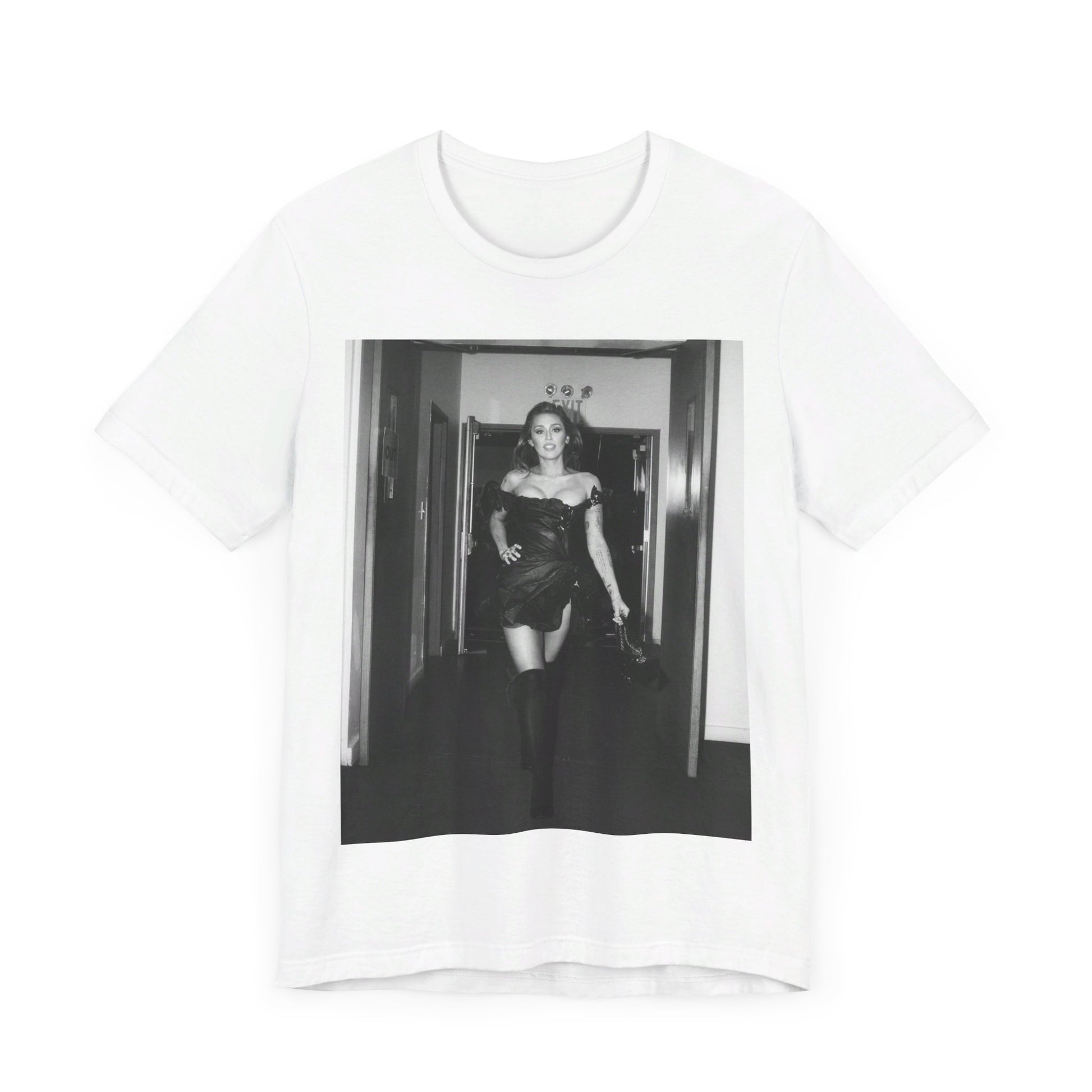 A black graphic t-shirt featuring a black and white graphic of Miley Cyrus in a cool pop rock style.