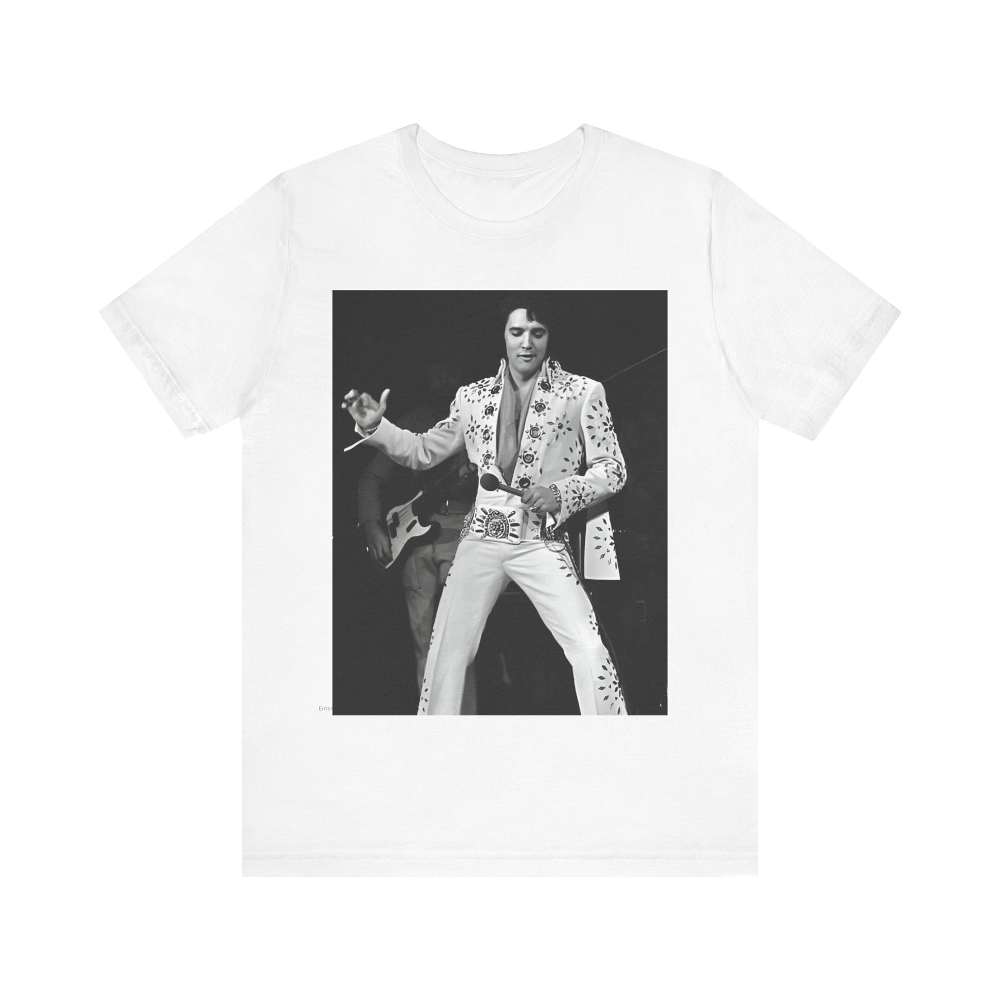 A black graphic t-shirt featuring a stylized graphic of Elvis Presley as The King of Rock 'n' Roll.