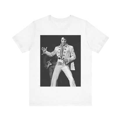 A black graphic t-shirt featuring a stylized graphic of Elvis Presley as The King of Rock 'n' Roll.