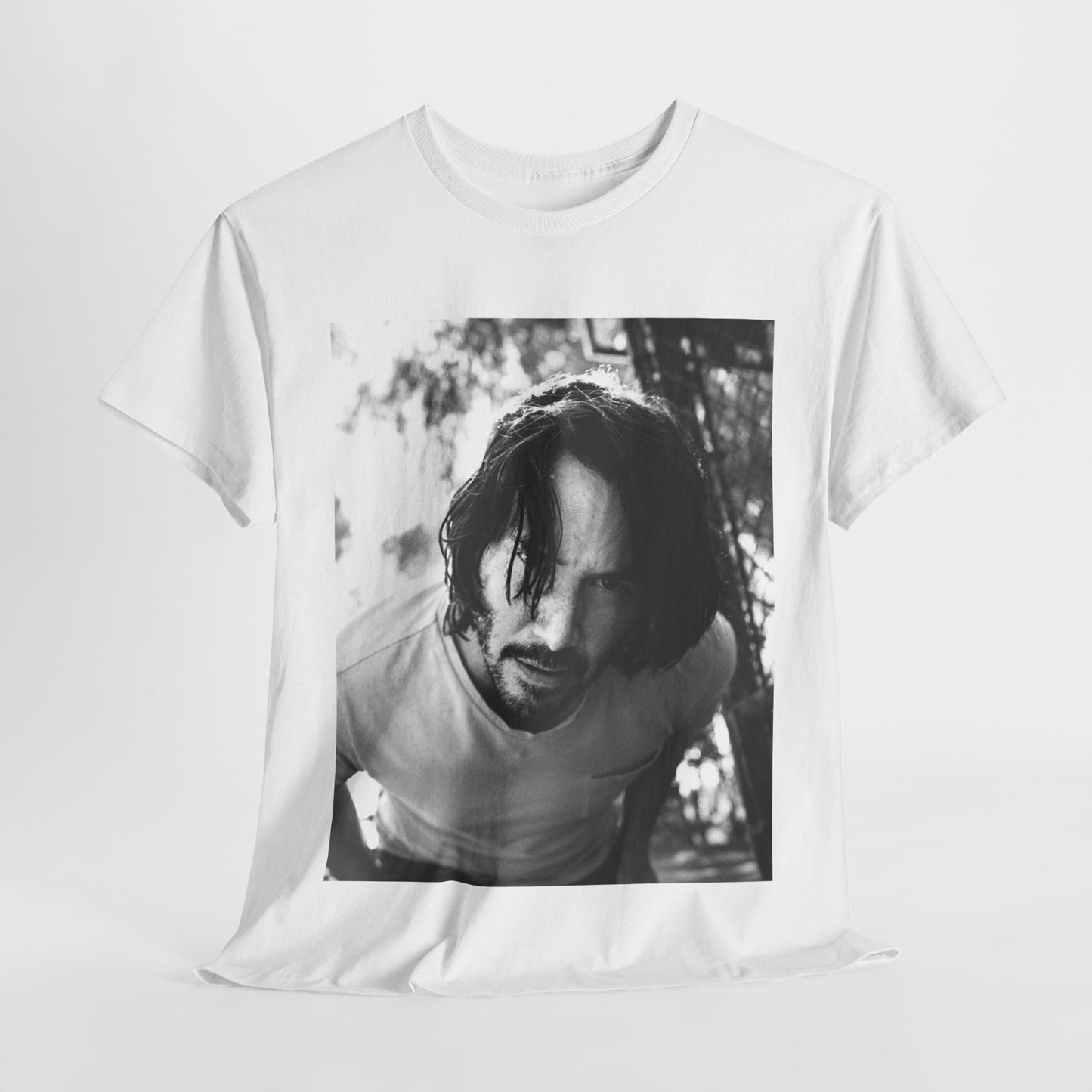 A black graphic t-shirt featuring a graphic of Keanu Reeves with authentic chill vibes.