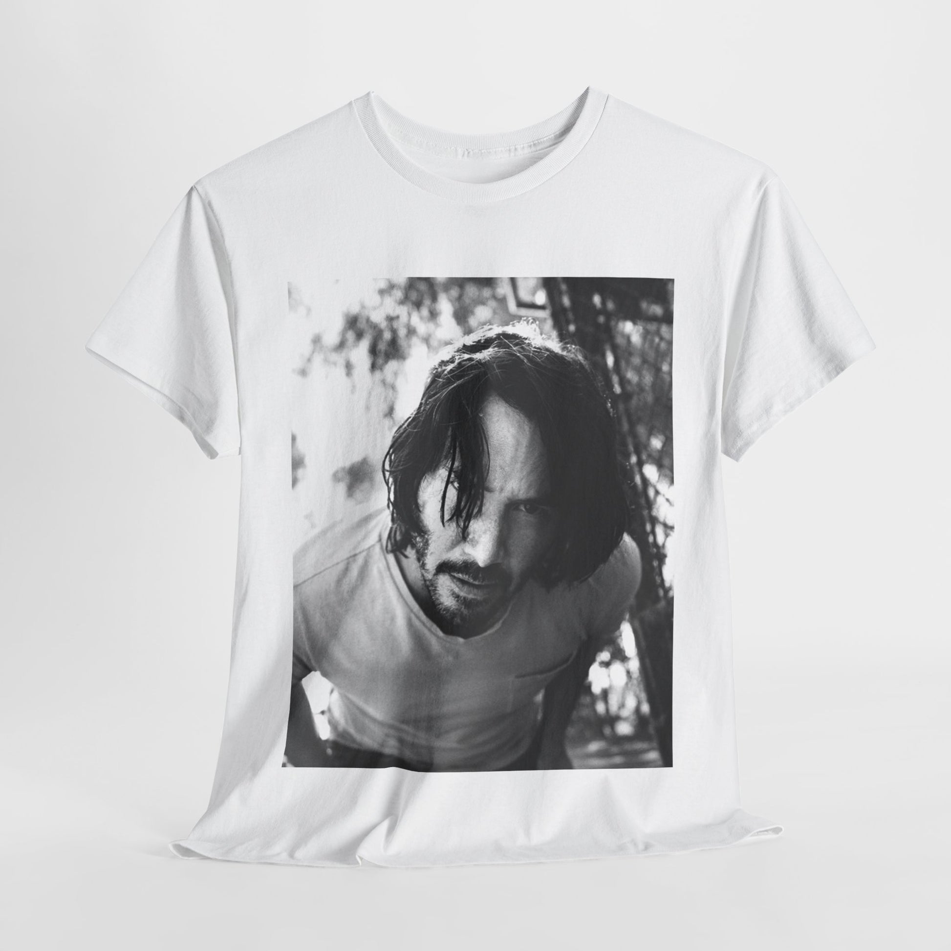 A black graphic t-shirt featuring a graphic of Keanu Reeves with authentic chill vibes.