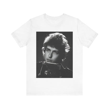 A black graphic t-shirt featuring a graphic of Bob Dylan from the 60s playing his harmonica.