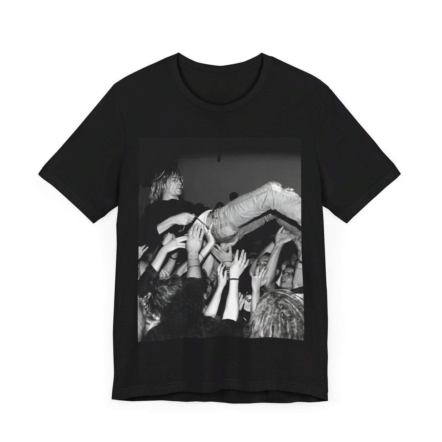 A black graphic t-shirt featuring a 90s graphic or photo of Kurt Cobain from Nirvana stage diving.