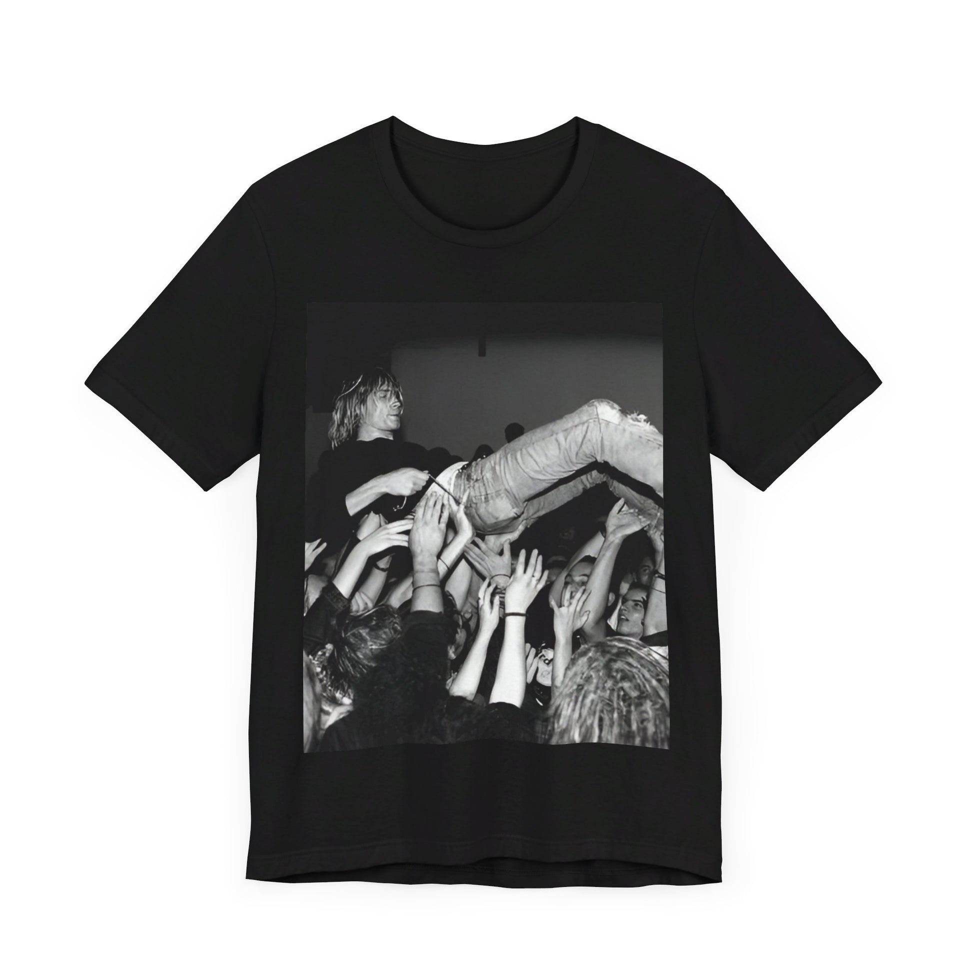 A black graphic t-shirt featuring a 90s graphic or photo of Kurt Cobain from Nirvana stage diving.