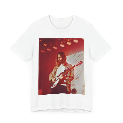 A black graphic t-shirt featuring a cool psychedelic journey graphic of Tame Impala.