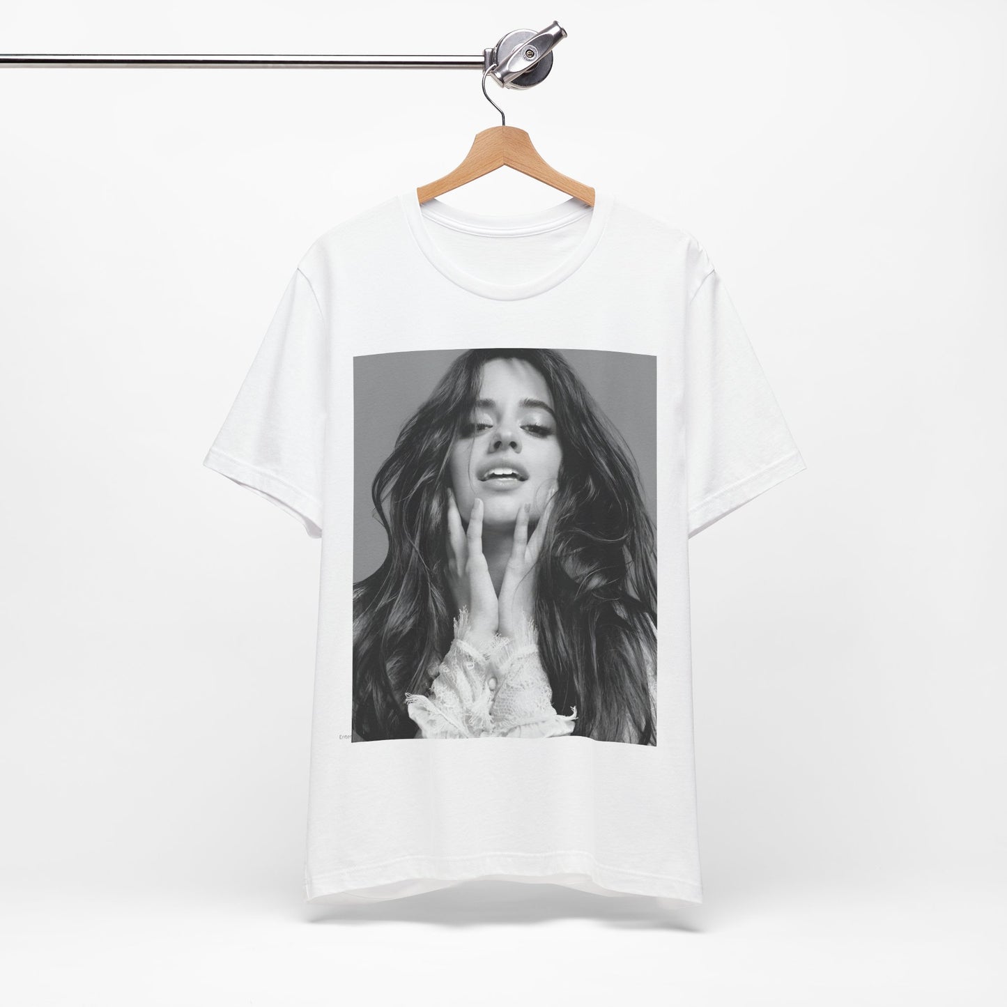 A black graphic t-shirt featuring a black and white portrait photo of Camila Cabello.
