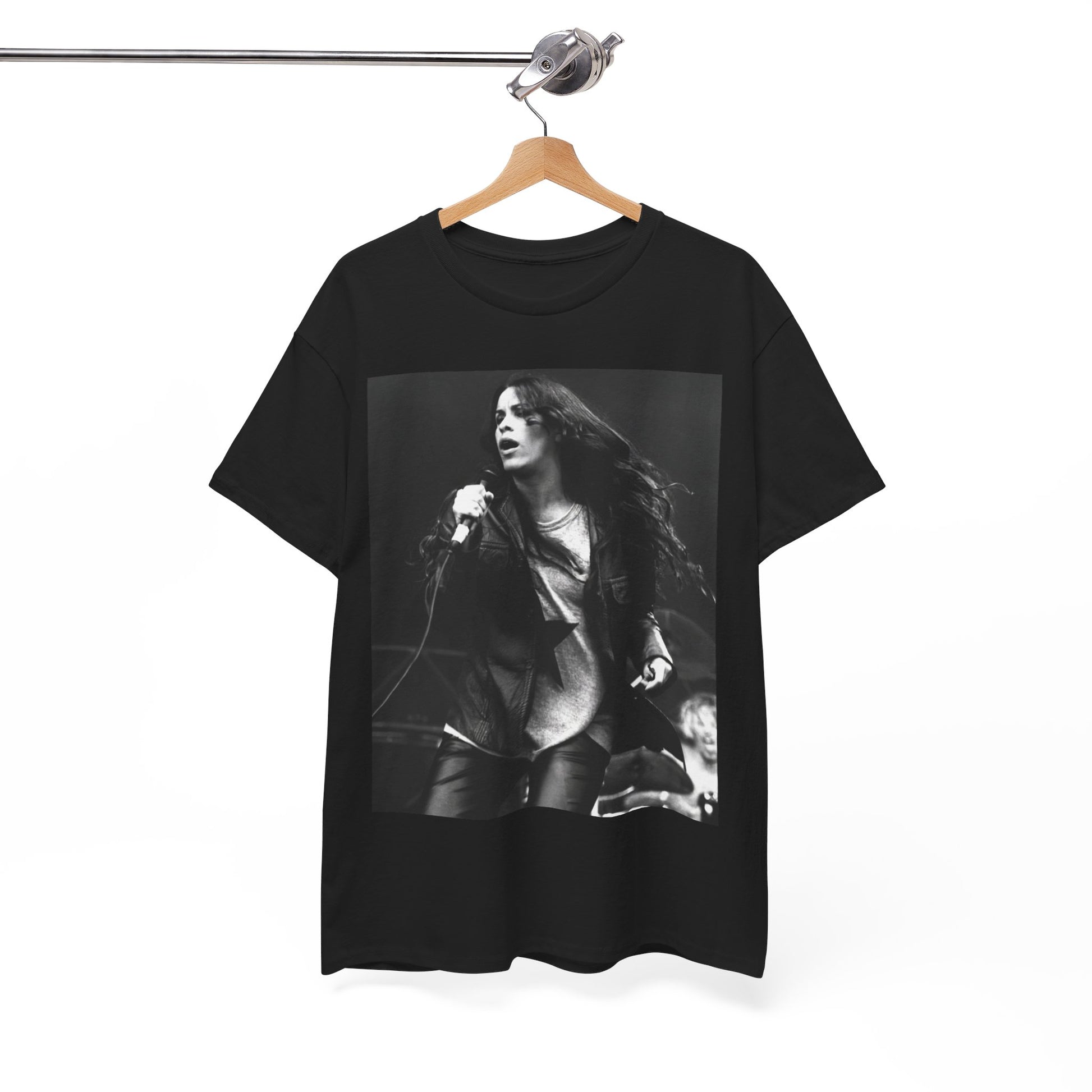 A black graphic t-shirt featuring a 90s-style concert graphic of Alanis Morissette, related to her "Jagged Little Pill" era tours.