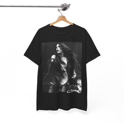A black graphic t-shirt featuring a 90s-style concert graphic of Alanis Morissette, related to her "Jagged Little Pill" era tours.