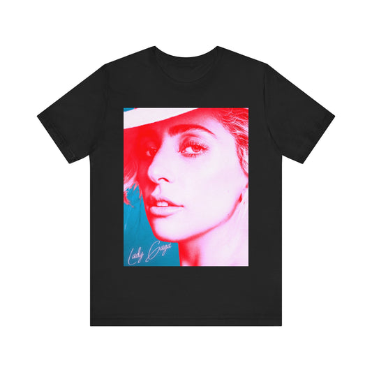 A black graphic t-shirt featuring a graphic related to Lady Gaga's 'Poker Face' song or era.
