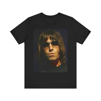 A black graphic t-shirt featuring a photo portrait of Liam Gallagher from Oasis.
