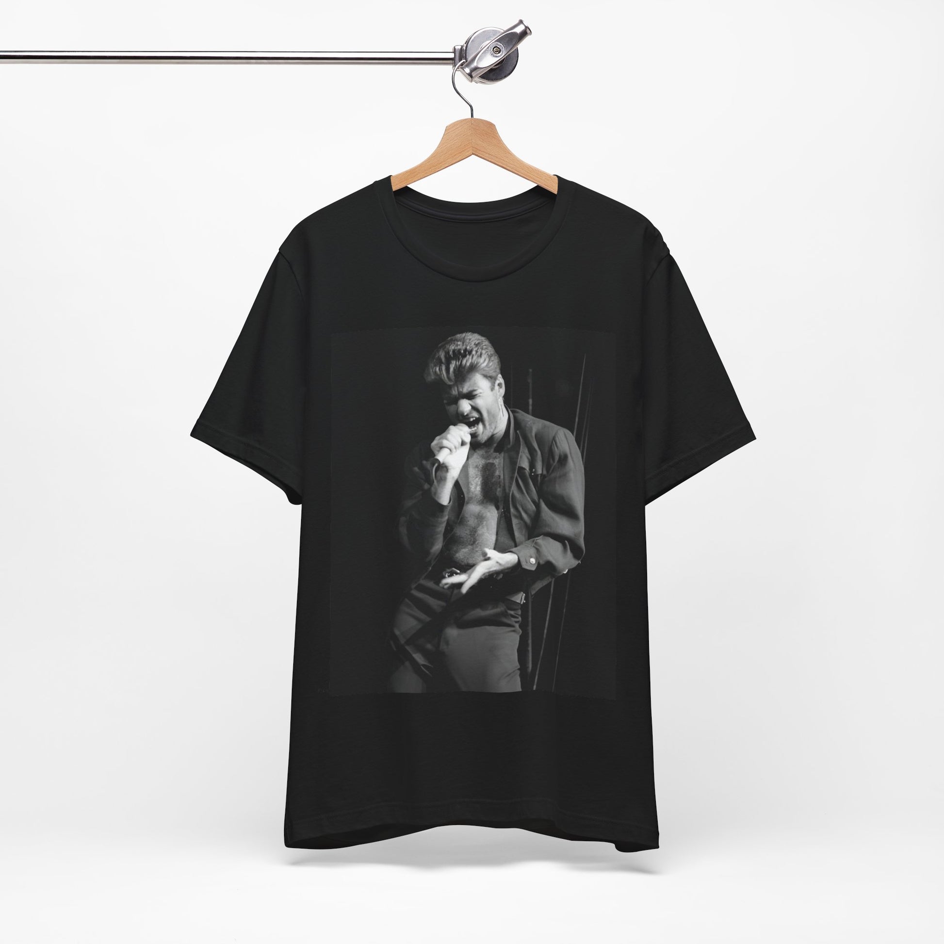 A black graphic t-shirt featuring a glamorous photo or graphic of George Michael performing live.