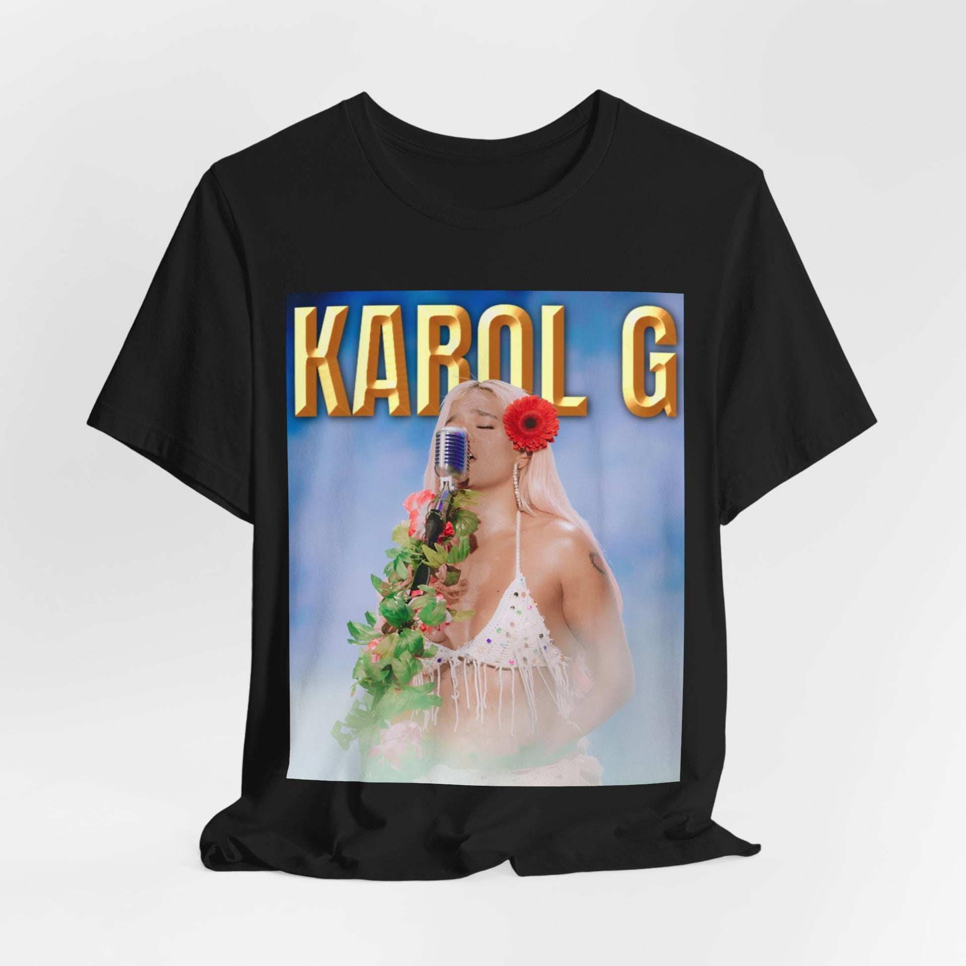 A black graphic t-shirt featuring a graphic of Karol G as a classic Latin pop queen.