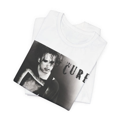 A black graphic t-shirt featuring a vintage goth rock graphic of The Cure.