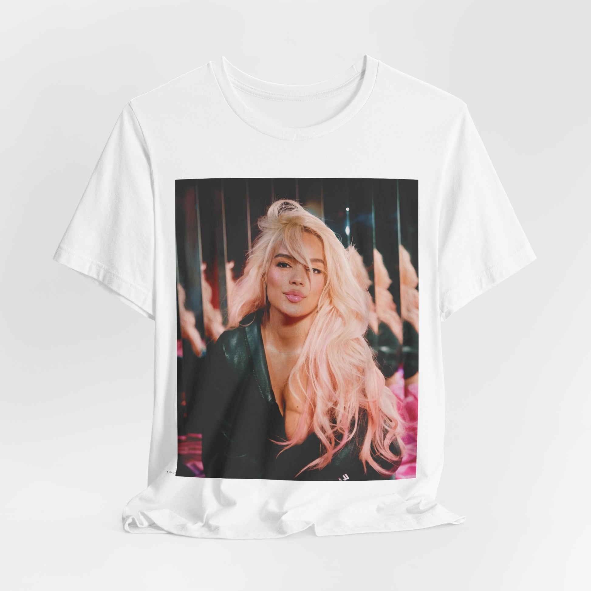 A black graphic t-shirt featuring a graphic of Karol G as an empowered Latina icon.