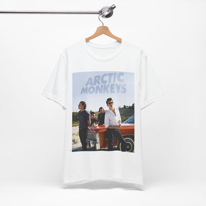 A black graphic t-shirt featuring a design related to Arctic Monkeys' 'AM' album era, possibly with the album art or band imagery.