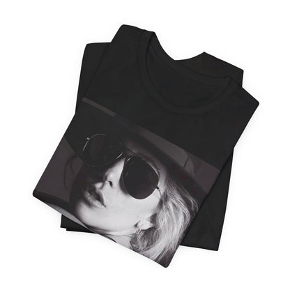 A black graphic t-shirt featuring a fierce graphic related to Lady Gaga's 'Bad Romance' song or era.
