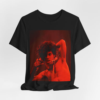 A black graphic t-shirt featuring a concert pop fan graphic of Prince.