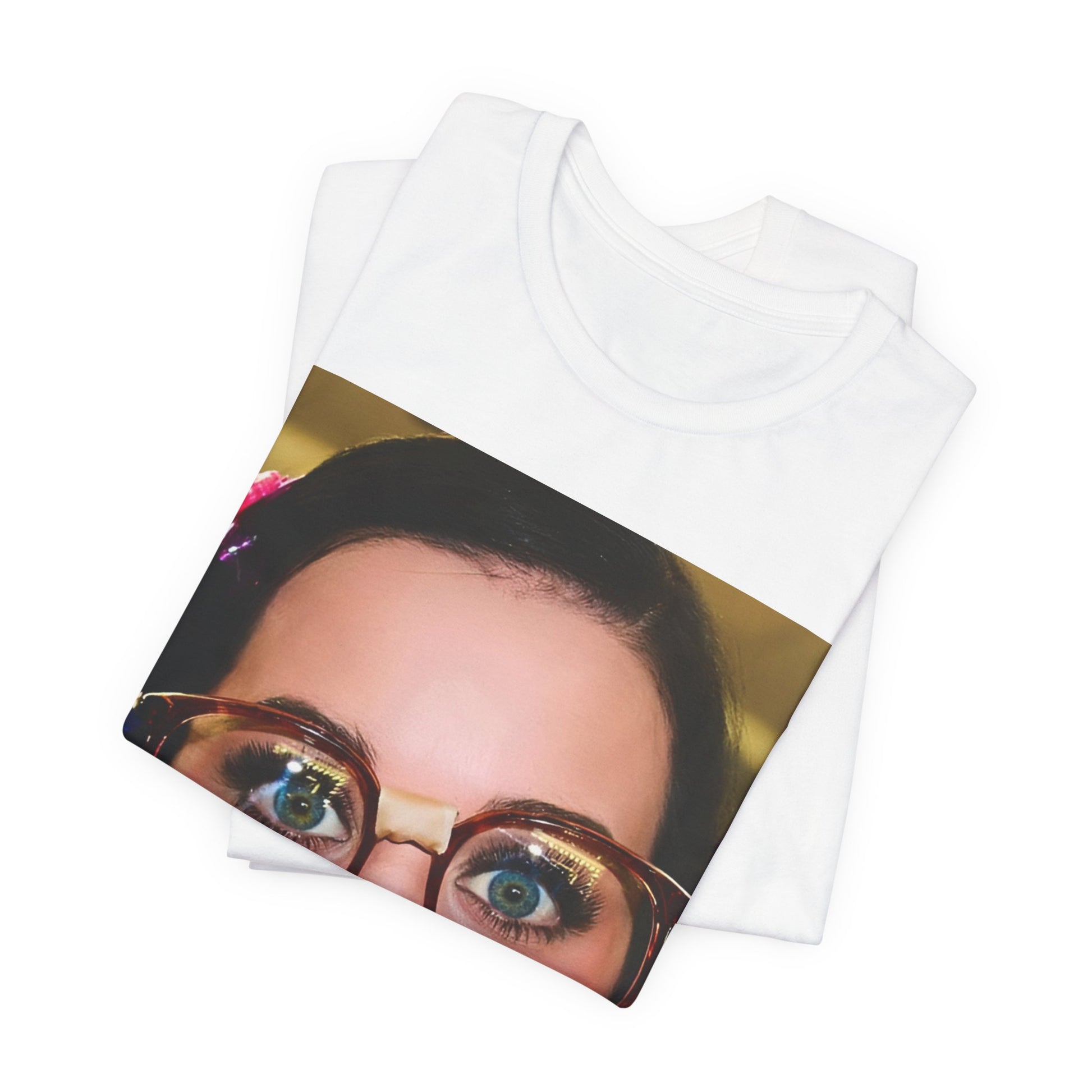 A black graphic t-shirt featuring a graphic related to Katy Perry's "I Kissed A Girl" song or era.