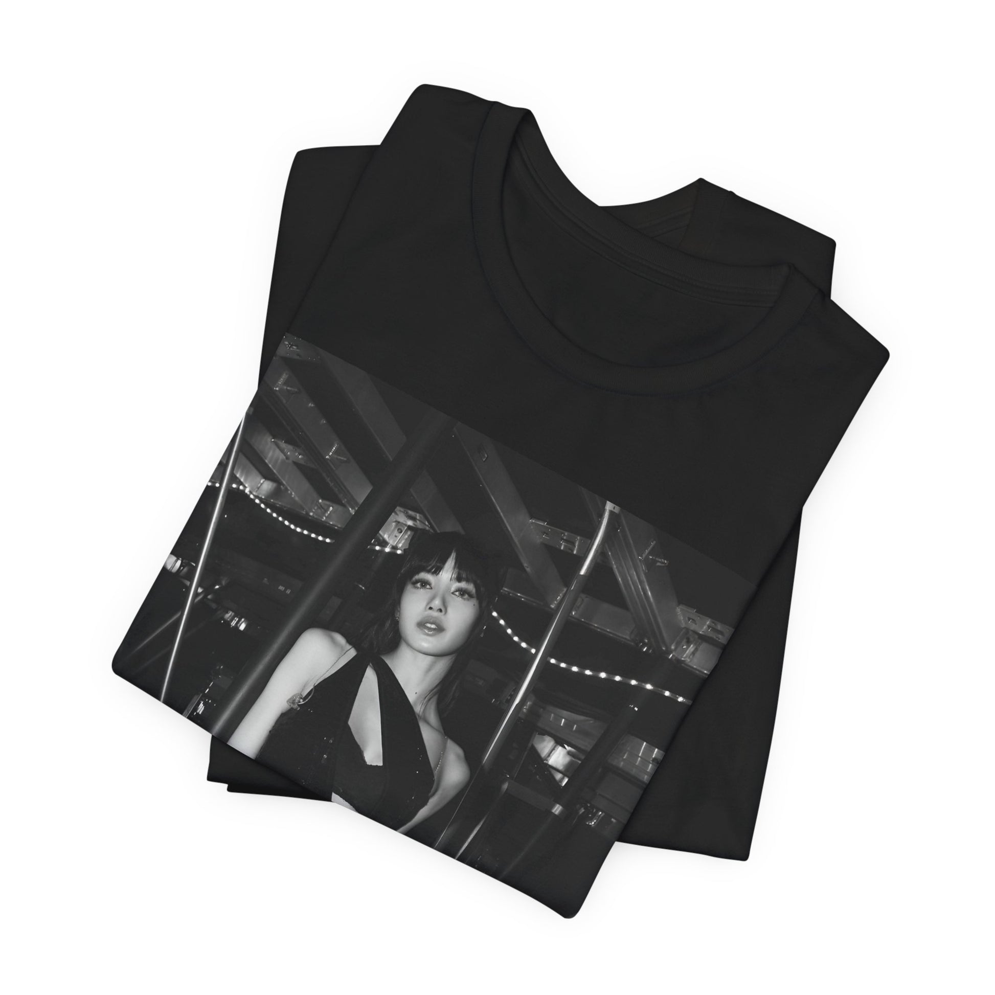 A black graphic t-shirt featuring a black and white graphic or photo of Lisa in a backstage setting.