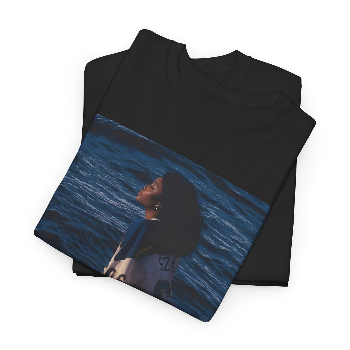 A black graphic t-shirt featuring a graphic related to SZA's 'SOS' album.