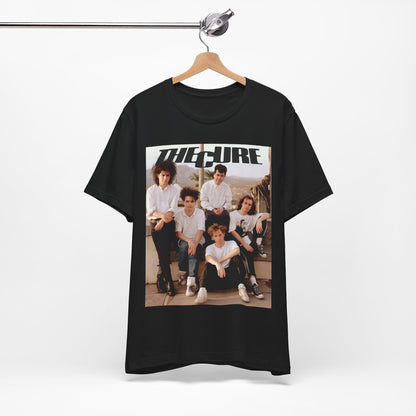 A black graphic t-shirt featuring a vintage graphic of The Cure with a dark romanticism theme.