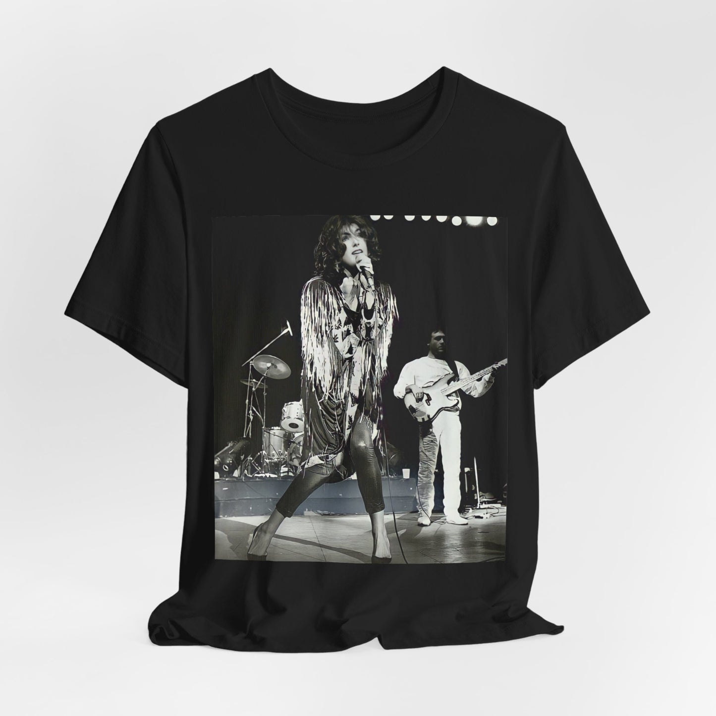 A black graphic t-shirt featuring an 80s black and white photo or graphic of Laura Branigan performing live on stage.
