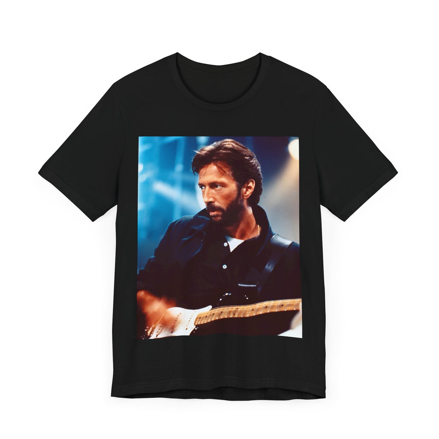 A black graphic t-shirt featuring a retro graphic or photo of Eric Clapton performing live on stage.