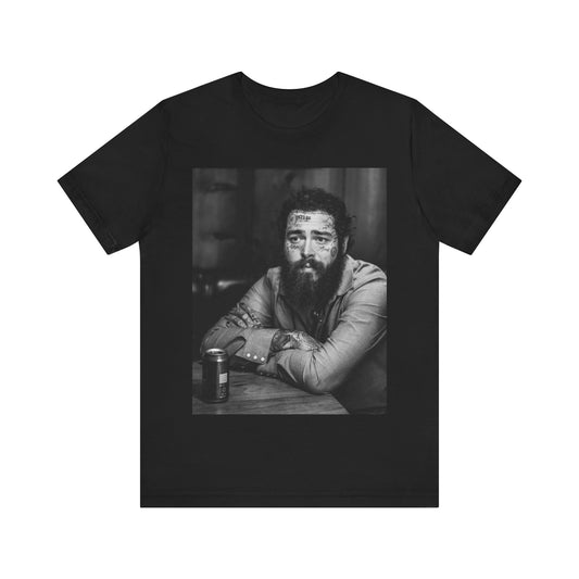 A black graphic t-shirt featuring a black and white, monochrome graphic or photo of Post Malone.