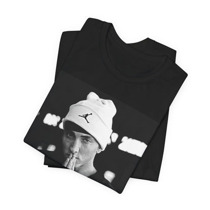 A black graphic t-shirt featuring a black and white portrait photo of Eminem.