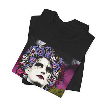 A black graphic t-shirt featuring a retro rock aesthetic pop art graphic of The Cure.