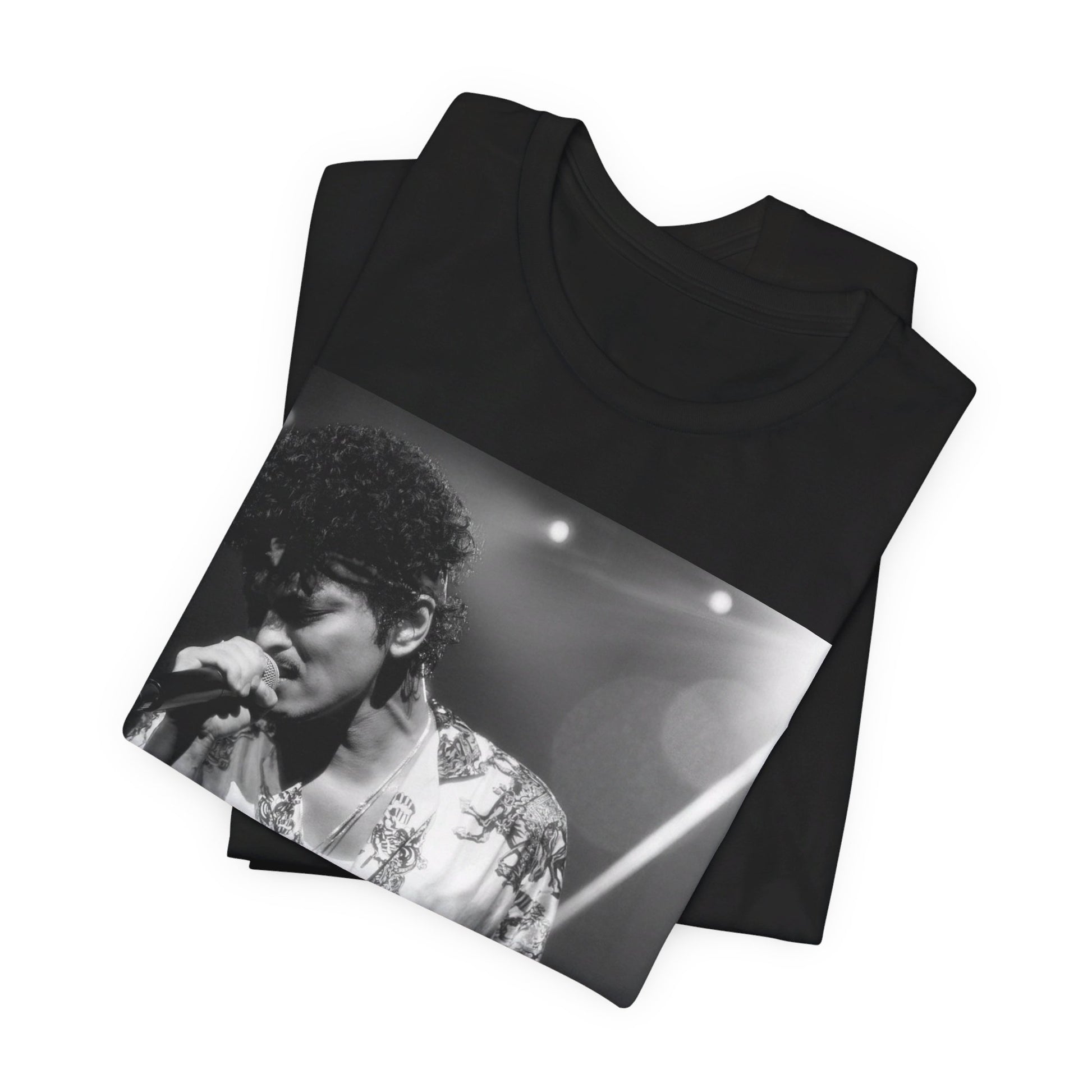 A black graphic t-shirt featuring a retro-style graphic of Bruno Mars as a soul icon.