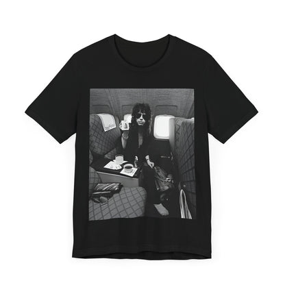 A black graphic t-shirt featuring a vintage 70s-style illustration of an airplane with Aerosmith branding, representing their tour plane from that era.