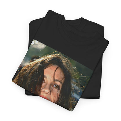 A black graphic t-shirt featuring a stylized graphic of Alanis Morissette from her 90s grunge era, with a raw and intense aesthetic.